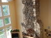 cape-interior-stone-fireplace